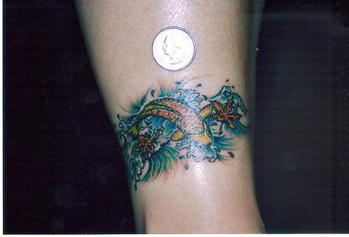 Small koi fish armband tattoo - Tattooimages.biz